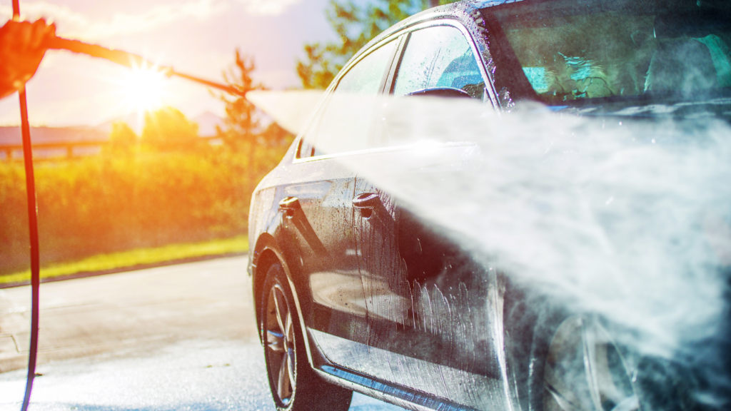 A car being washed during the summer months